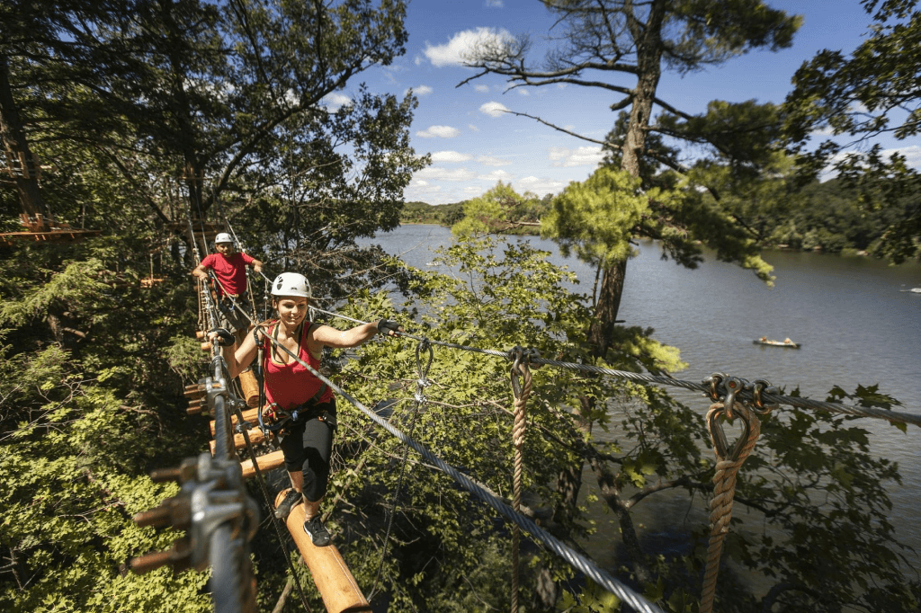high-ropes-course-woman-over-water