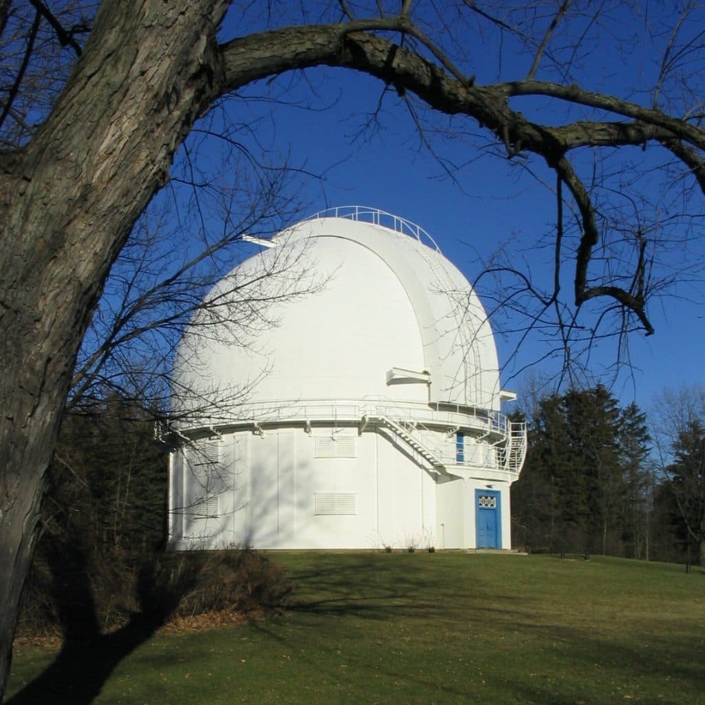 observatory-dome-blue-door-grassy-hill