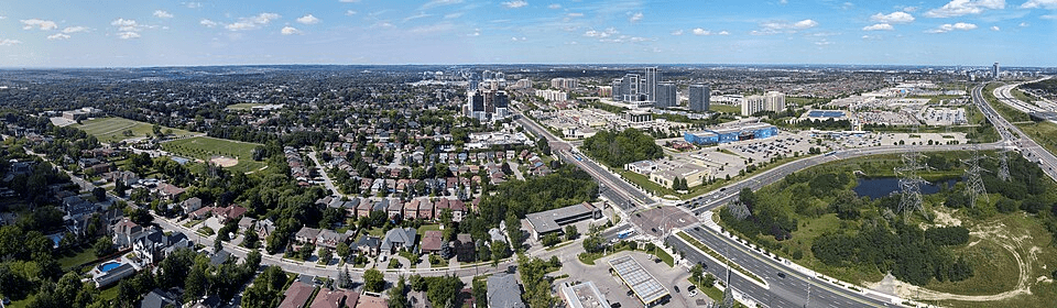 suburban-neighborhood-highway-commercial-aerial