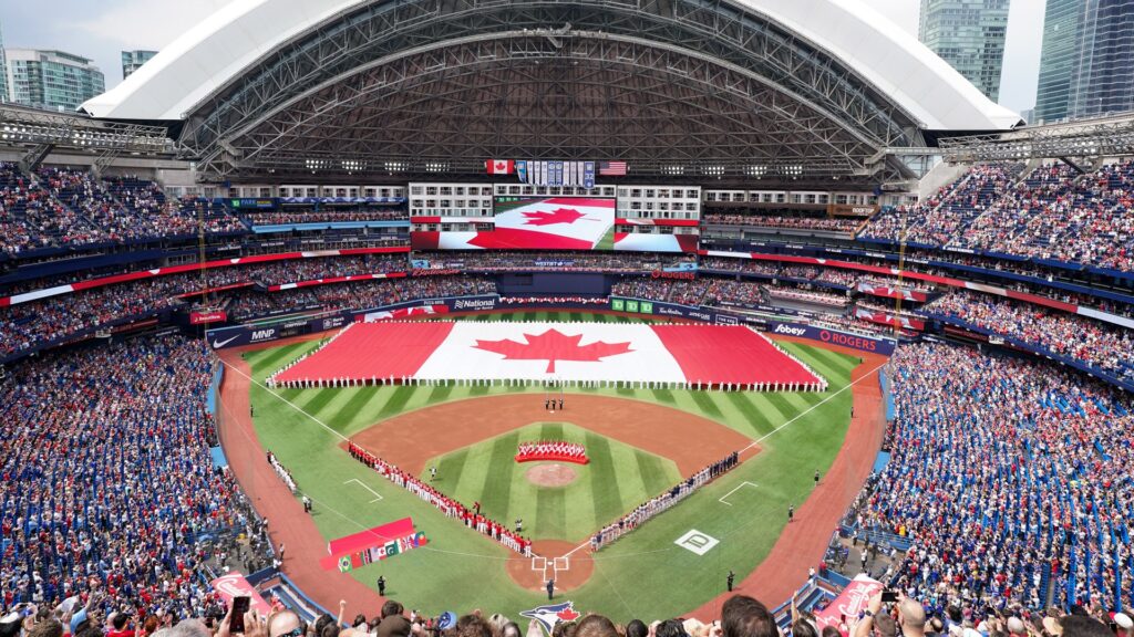 Canadian flag displayed on a baseball field at Rogers Centre, Toronto Takeoff-Moving Toronto